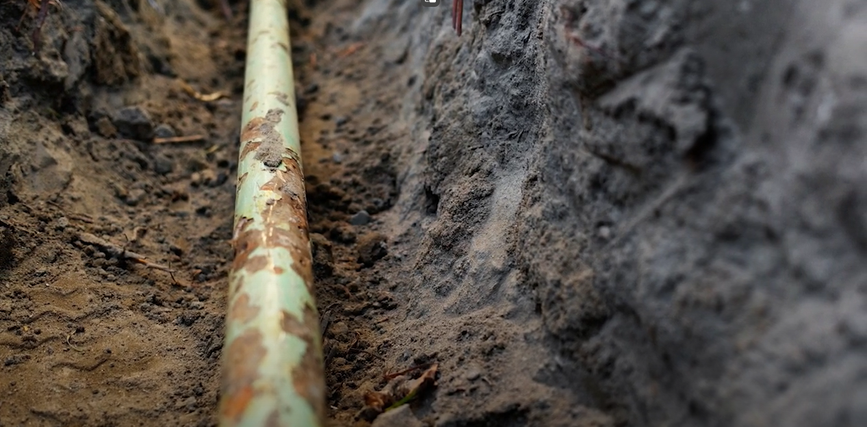 pipe underground in dirt